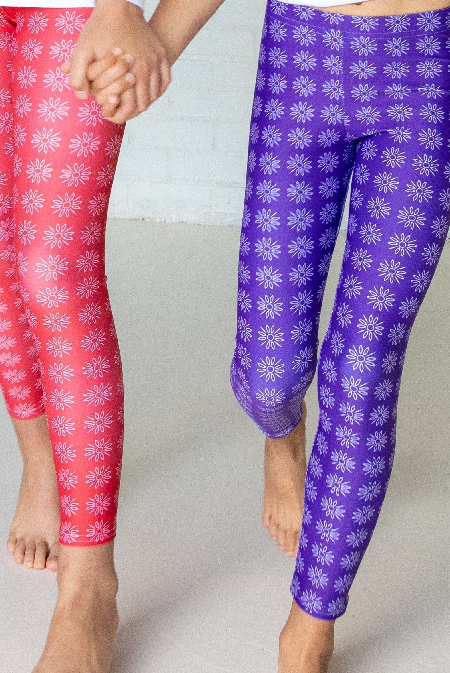 Bellybunny-Youth Leggings-purple with white sun pattern and red with white sun pattern
